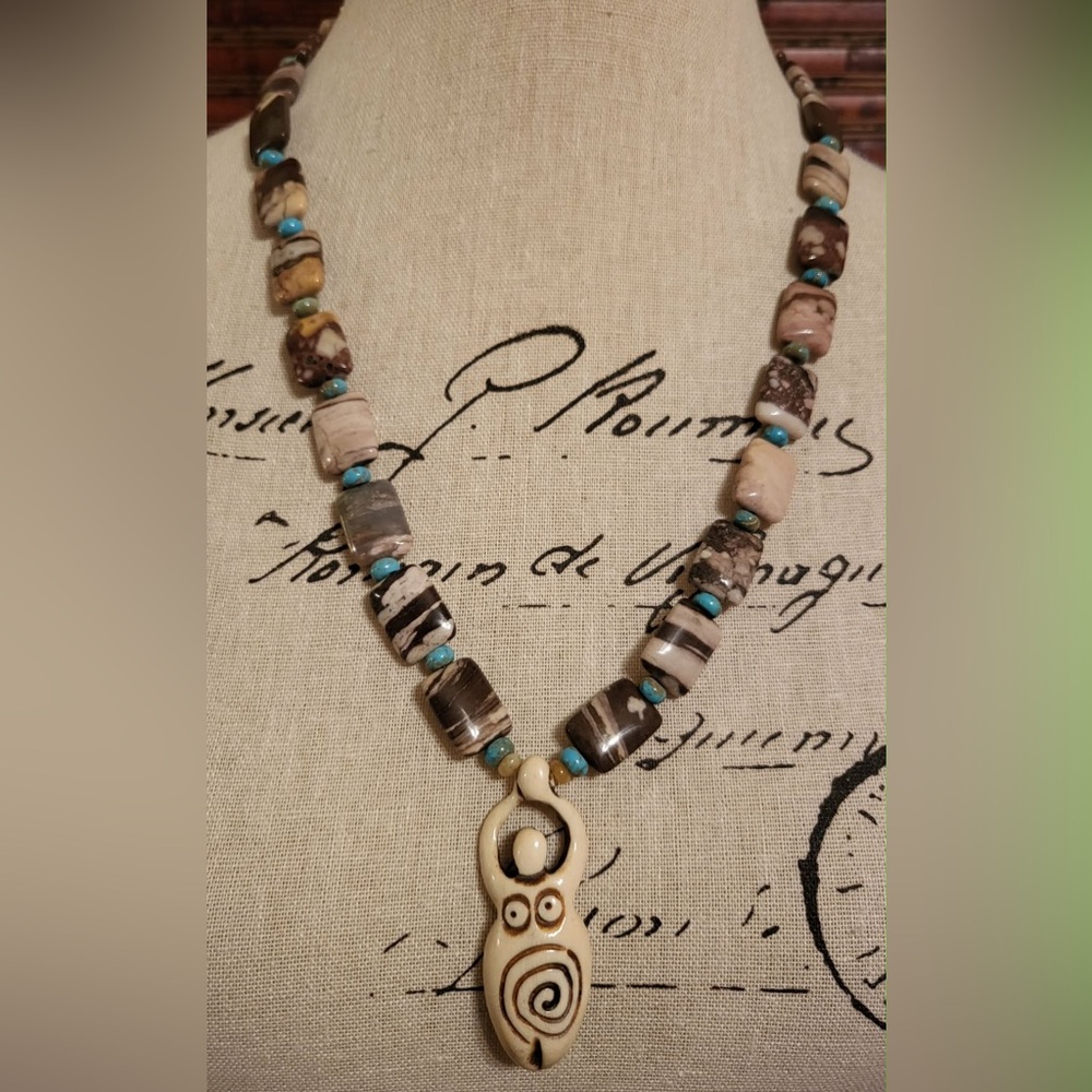 Handcrafted Beaded Necklace with Tribal Pendant